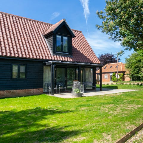 Sit out on your covered patio and enjoy the views across the farmland