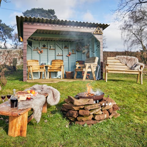 Settle down in the orchard with the stone fire pit lit and a bottle of wine to enjoy the sunset