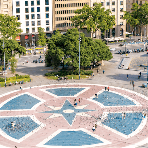 Walk down to the famous Plaça de Catalunya
