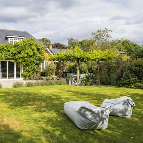 Soak up the sunshine from the squishy loungers in the garden