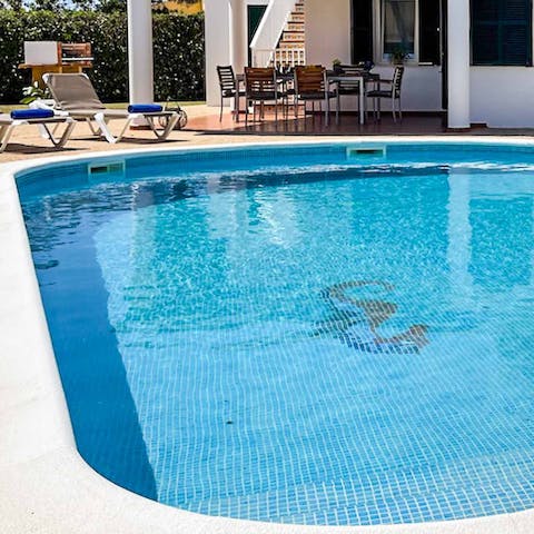 Cool off from the Menorcan sun in the private swimming pool 
