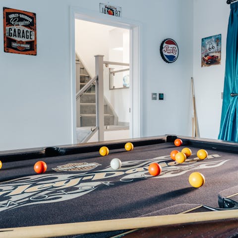 Shoot some pool in the games room with friends