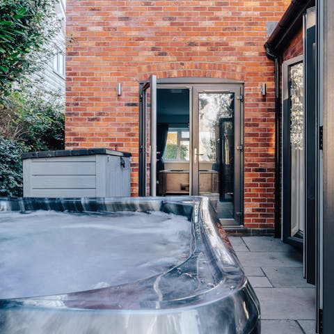 Enjoy a glass of bubbly in the hot tub