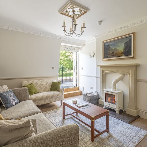 Snuggle up in front of the wood burner in the elegant living room