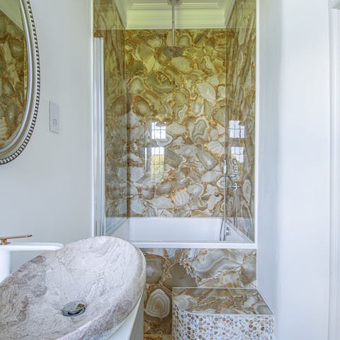Treat yourself to a shower or a bath in the stylish Japanese soaking tub