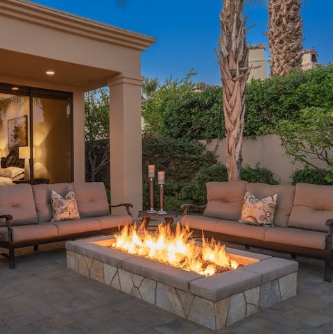Open a fine bottle of wine and relax around the fire