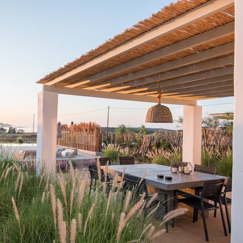 Drink or dine alfresco on the covered, private terrace