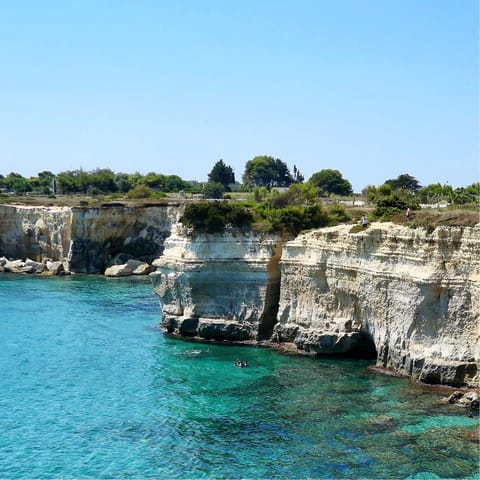 Explore Puglia's shimmering coastline – the nearest beach is just a fifteen–minute drive away