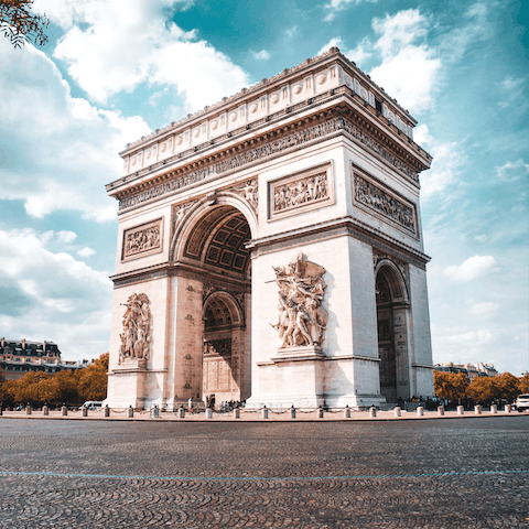 Visit the Arc de Triomphe, a must-see while in Paris