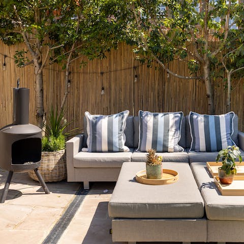 Bask in the sun in the wonderful garden or gather around the chimenea if it turns chilly 