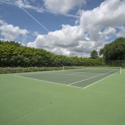 Get active at your on-site tennis court 