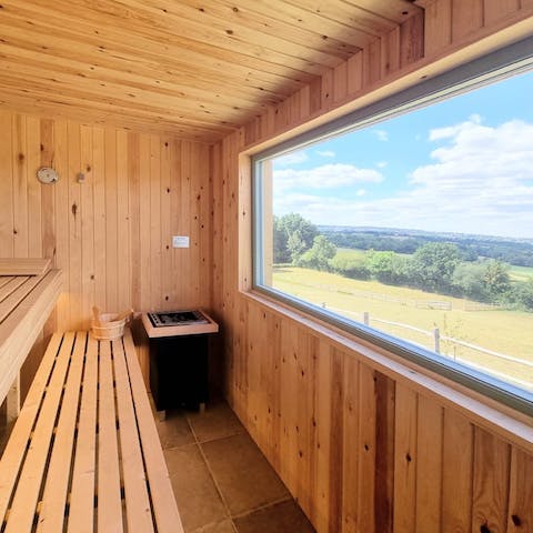 Look out at quintessentially British landscape from the quintessentially Scandi sauna