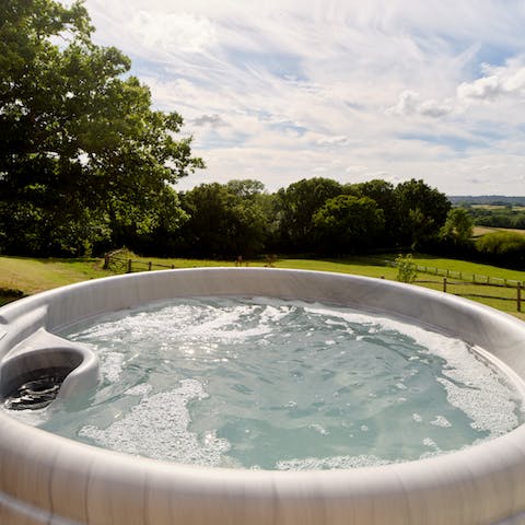 Marvel at the High Weald AONB from the comfort of the hot tub
