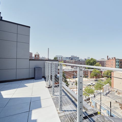 Step out onto the balcony and breathe in the fresh air as you look over the streets of Cambridge