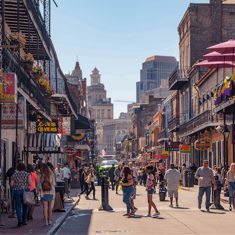 Immerse yourself in the lively atmosphere of Bourbon Street, a seven-minute walk away