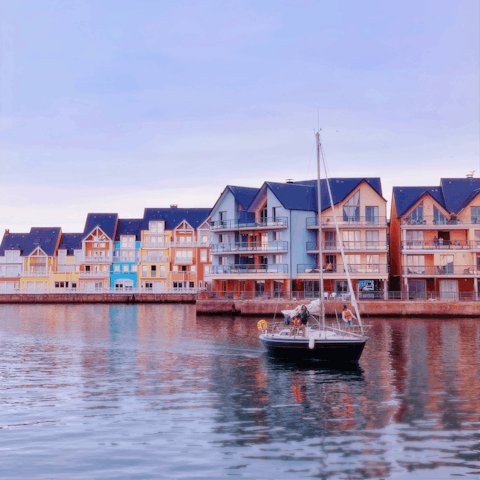 Enjoy soaking up the sunshine in lovely Deauville, a colourful seaside town packed with charm