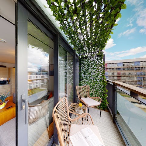 Enjoy an alfresco drink on your private glass fronted balcony