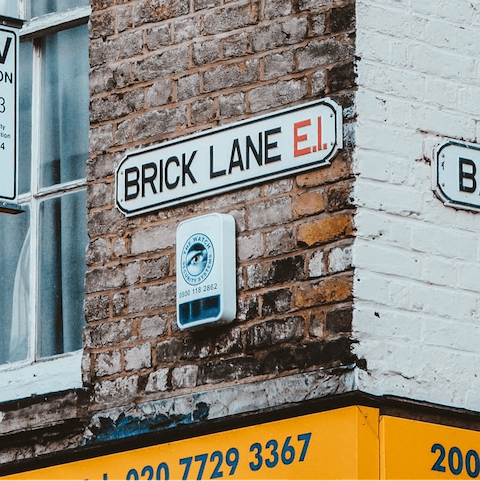 Head to Brick Lane for street art, vintage shops, and international eateries