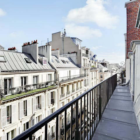 Step out onto the small balcony and admire the views