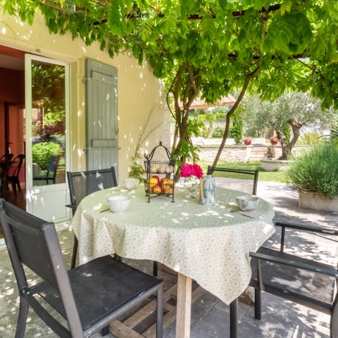Dine alfresco surrounded by the lush garden and enjoy total privacy