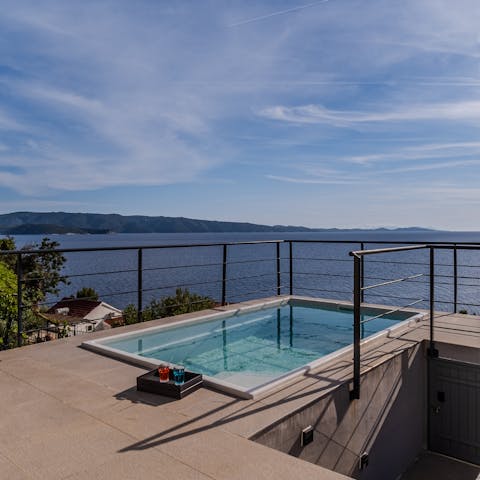 Plunge into the private pool and float in the cool water