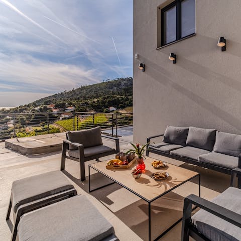 Relax on the terrace with a good book or a glass of something fruity