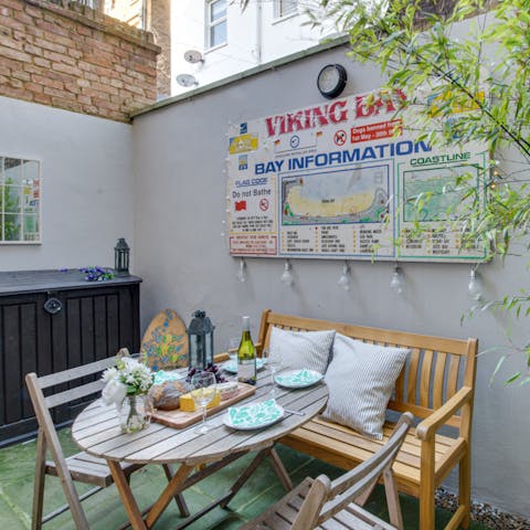 Enjoy a glass of wine or two in your cosy courtyard