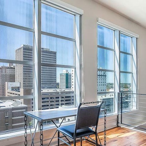 Catch up on work during your stay with a stunning cityscape before you