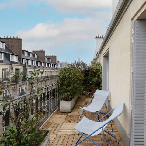 Savour the magic of Paris while relaxing on the private terrace