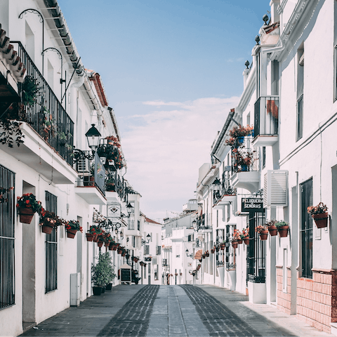 Explore the charming town of Mijas, easily reached by car
