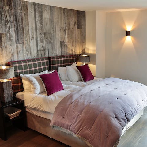 Rejuvinate in chalet-chic bedrooms after a day on the slopes