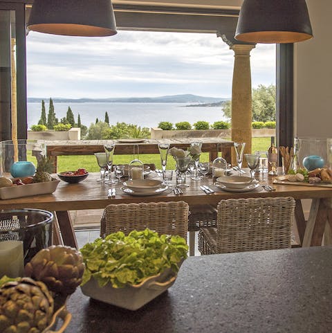 Throw open the sliding doors and let a gentle breeze drift through the kitchen-dining space