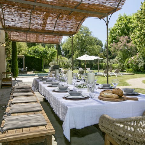 Gather around the table for alfresco French meals in the sun