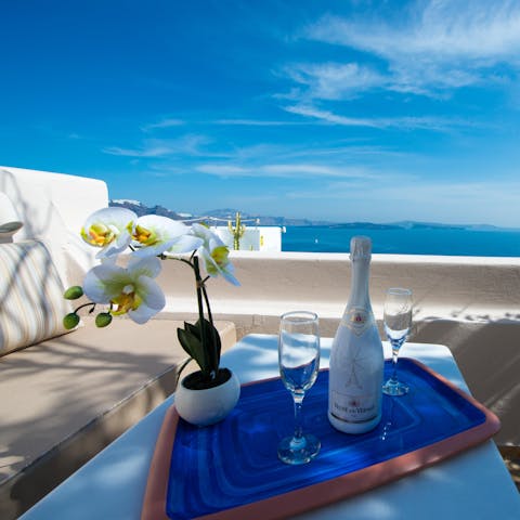 Sip a glass of Champage on the terrace as you admire the sea views