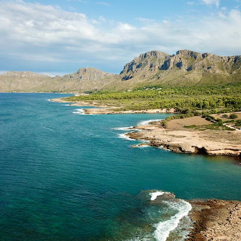 Make the twenty-minute drive to Platja de Muro for a swim in the Mediterranean Sea