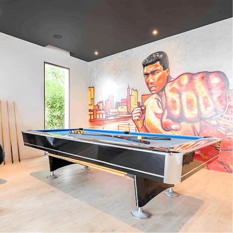 Unwind at home with a few games of pool with friends