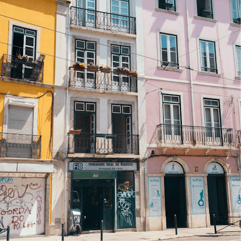 Explore the nearby district of Bairro Alto, with cobbled streets and landmarks