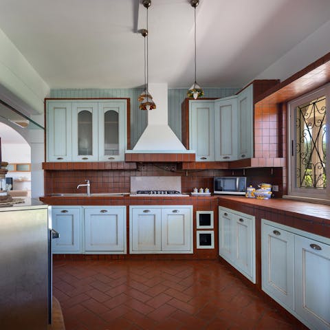 Whip up a delicious feast in this plush kitchen after researching Apulian recipes