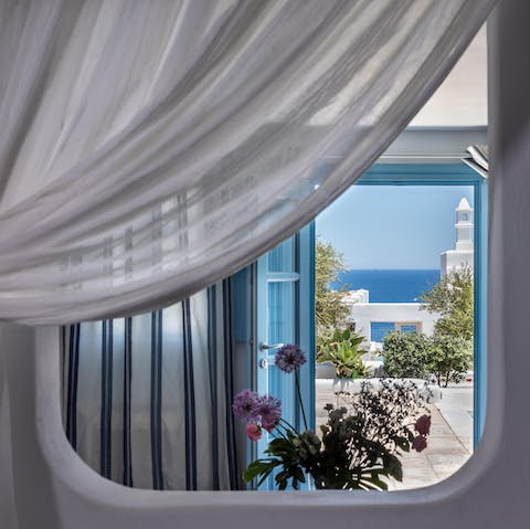 Take in gorgeous views of the Aegean Sea from your home's picture windows
