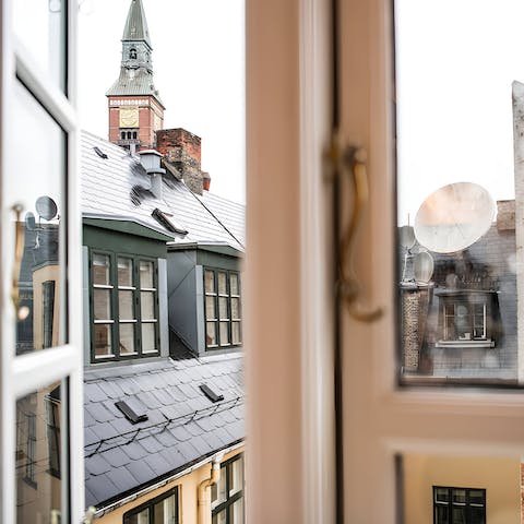 Take in the views over Copenhagen's rooftops from the living area