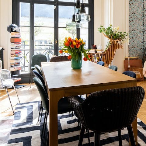 Savour Parisian delicacies and French wine at the dining table