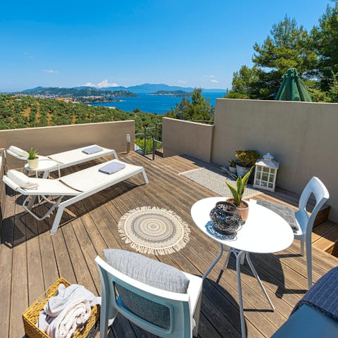 Admire views of the Aegean Sea from the private terrace