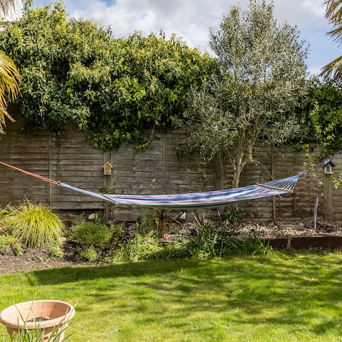Soak up the sunshine from the hammock in the garden