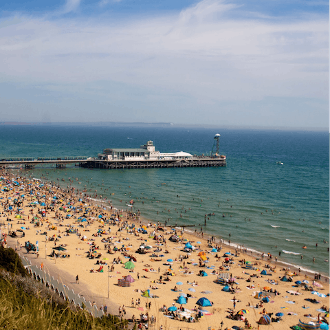 Pack a picnic and your seaside essentials and set out on the twenty-minute drive to Bournemouth Beach