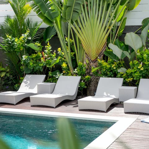 Soak up the sun from the poolside loungers