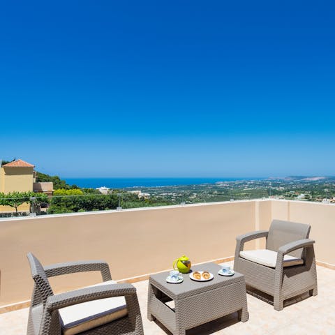 Gaze out over the Cretan coast from the first-floor terrace