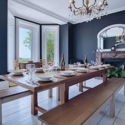 Lay the table for a glamorous dinner party overlooking the sea 
