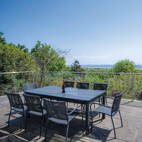 Take in the views of the Gower Peninsula with sundowners