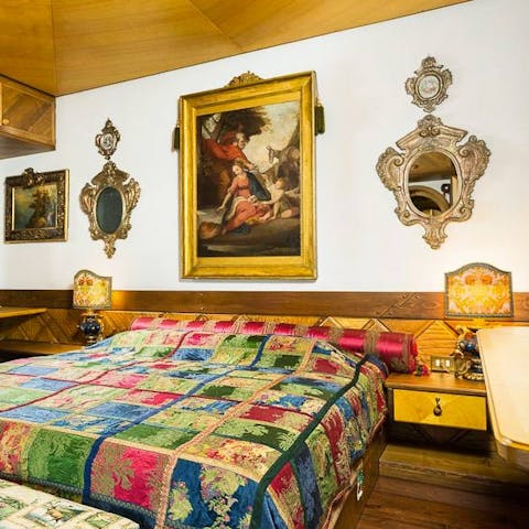 Antique pictures and objects adorn the walls