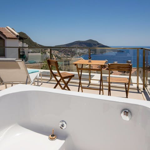 Relax in the jacuzzi hot tub before the scenic views 